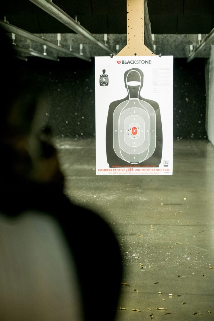 Paper shooting target at the end of a range lane after a scored match