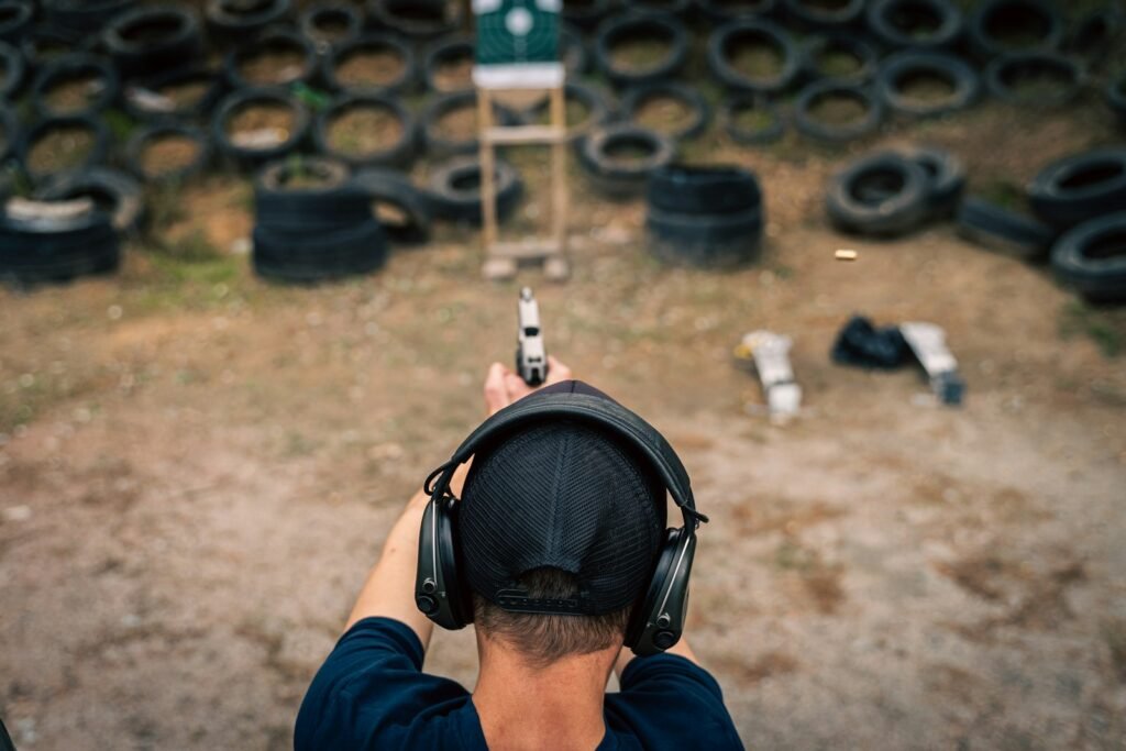 Firearms instructor coaching a student during a private lesson at Topflight